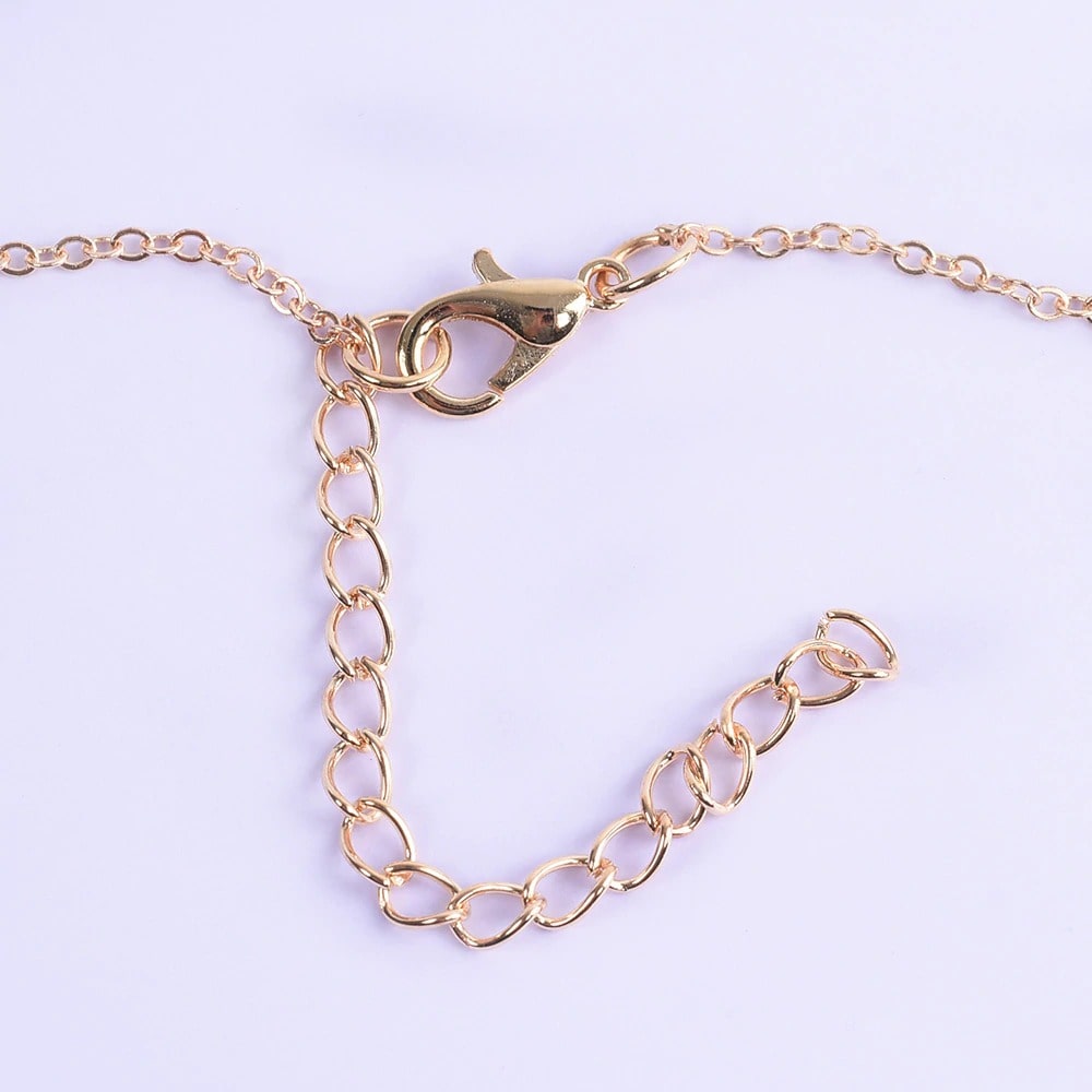collier coquillage mousqueton