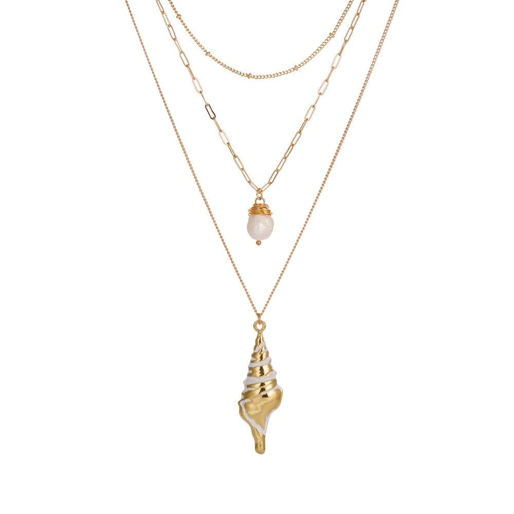 Bijou coquillage doré