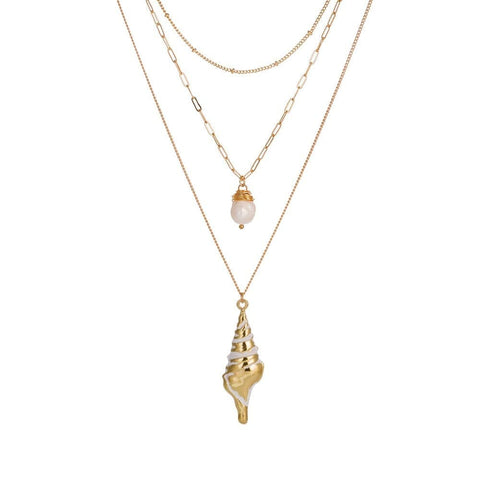 Bijou coquillage doré