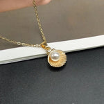 Bijou coquillage et perle