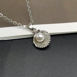 Bijou perle de coquillage