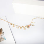 chaîne doré collier coquillage