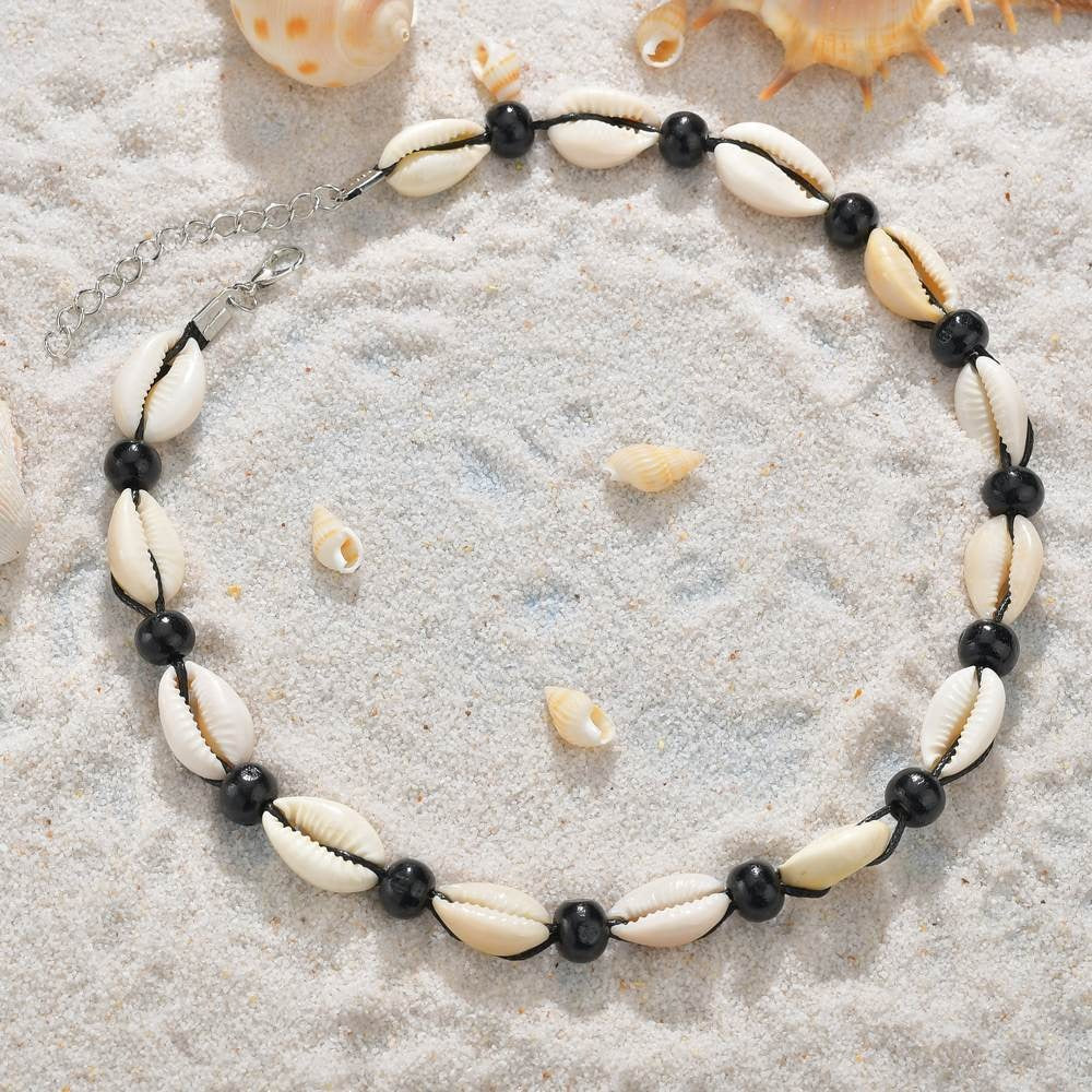 collier avec coquillage et perle