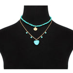 collier bleu ras de cou