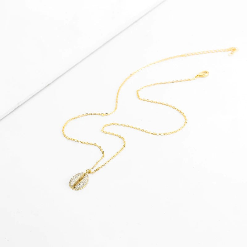 Collier cauri couleur or