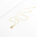 Collier cauri couleur or
