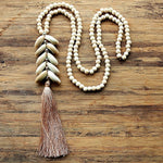 collier cauri perle