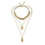 Collier coquillage ras de cou or