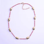 collier perle de coquillage