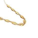 collier doré coquillage
