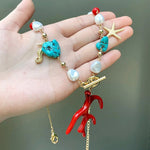 Collier doré rouge