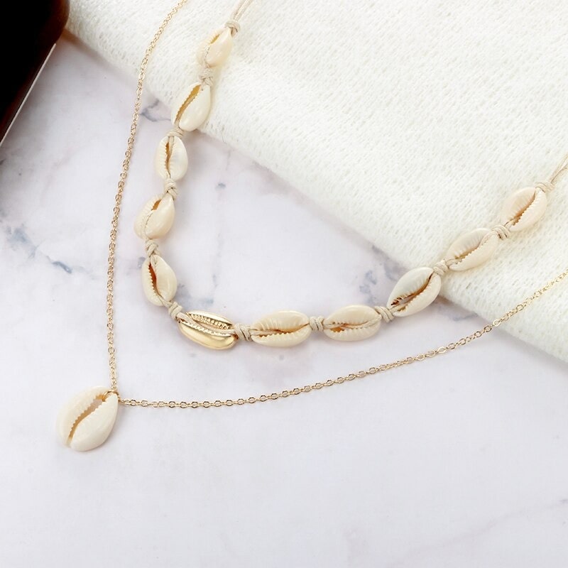 Collier double cauris
