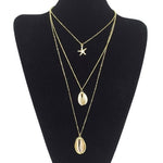 Collier pendentif cauri