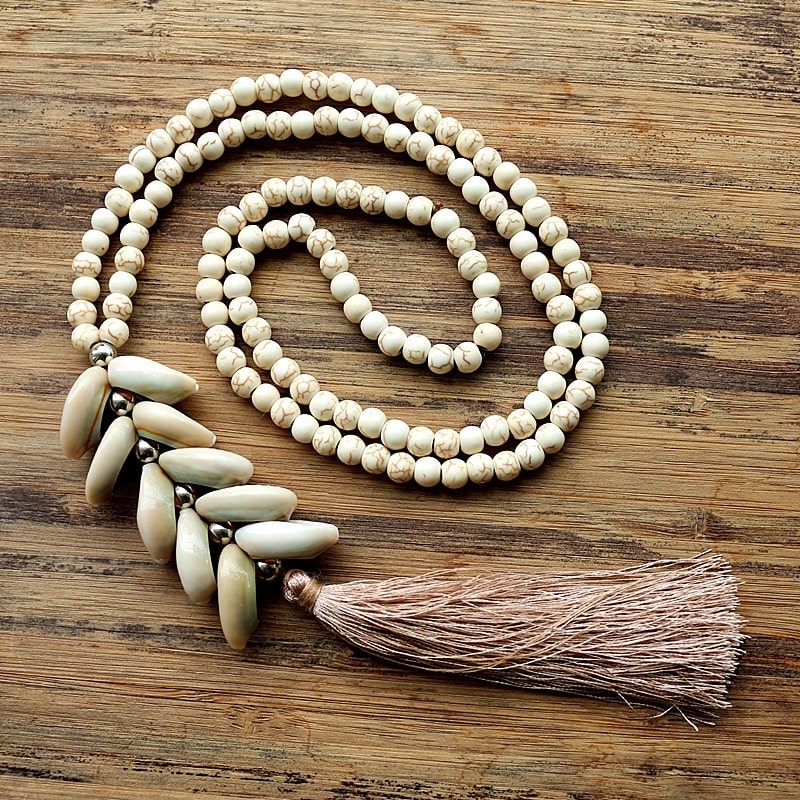collier perle cauri