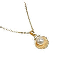 Collier perle de coquillage