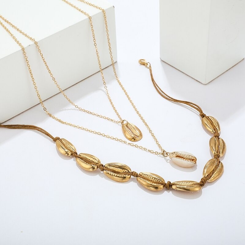 collier triple cauris