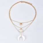 Collier triple pendentif blanc