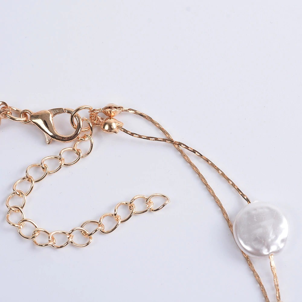collier médaille nacre coquillage