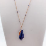 pendentif violet coquillage